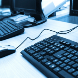 Computer table with computer keyboards