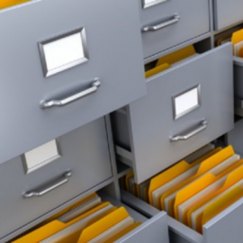 Set of file cabinets with some drawers open